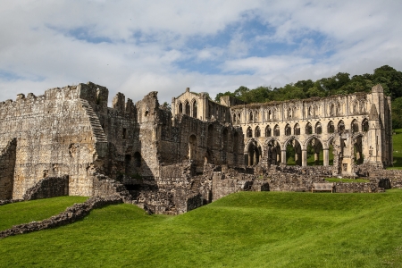 Scenic view of ruins of Rievaulx Abbey under cloudscape, North Yorkshire Moors, National Park, England の写真素材