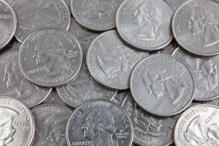 A lot of US quarter dollar coins 