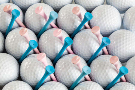 Golf balls and blue and pink teesの写真素材