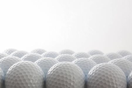 Golf balls on the white backgoundの写真素材
