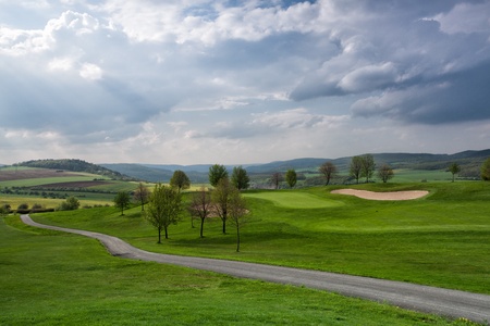 On the empty golf course in spring in Czech Republicの写真素材
