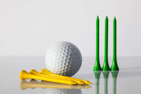 Different golf equipments on the glass tableの写真素材