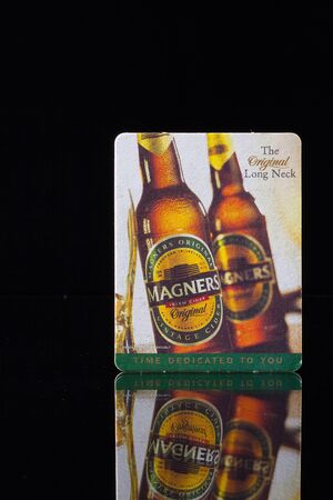 ENGLAND,LONDON - November 11, 2014: Beermat from Magners beer.Bulmers Irish Cider, branded as Magners Irish Cider outside the Republic of Irelandのeditorial素材