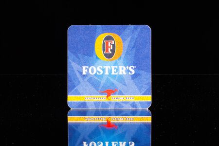 ENGLAND,LONDON - November 11, 2014:Beermat from Fosters beer.Fosters Lager is an internationally...