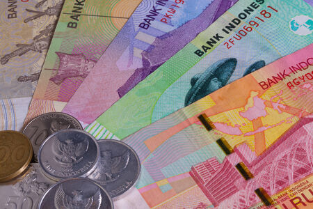 Different Indonesian rupiah banknotes on the table