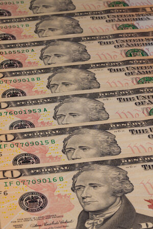 Detail of the same pattern of dollar bills on the table