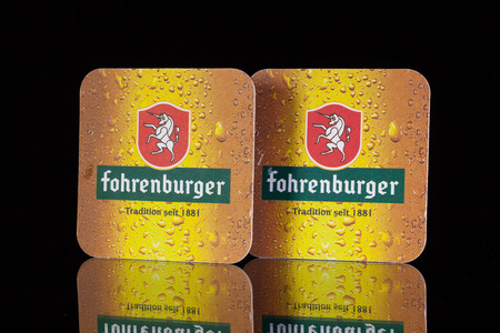 GERMANY,BERLIN - January  7,2015:Beermats from Fohrenburger beer.It was more than 120 years ago when Fohrenburger Beer founder Ferdinand Gassner was not happy about the beer he received in his restaurant.のeditorial素材