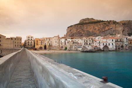 Sunrise in CefalÃ¹, Sicily, Italy. It is an attractive historic town and seaside resort.の写真素材
