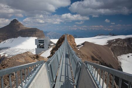 Vaud,Switzerland - July 11,2015: Peak Walk bridge.Peak Walk is a pedestrian suspension bridge linking two mountain peaks in the Swiss Alpsのeditorial素材