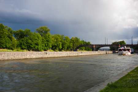 Prague, Czech Republic - July 23,2015 : Sightseeing boat in the shipping lock before heavy storm.のeditorial素材