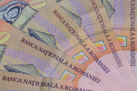Different Romanian Lei Banknotes on the tableの写真素材