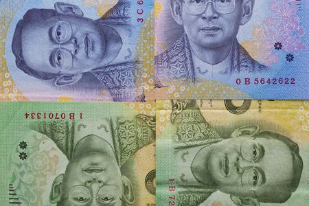 Detail of banknote and coin of Thai Baht of Thailandの写真素材