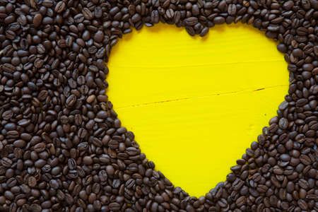 Big yellow heart from coffee beansの写真素材