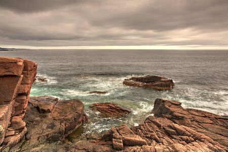 View of the rocky cliff shore line at Acadia National Park. Maine, New England, USA - HDR Imageの写真素材
