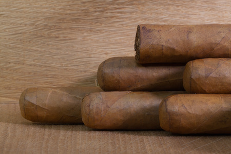Luxury Cuban cigars  on the wooden table.の写真素材