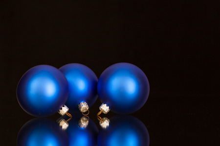 Blue Christmas decoration on the glass tableの写真素材