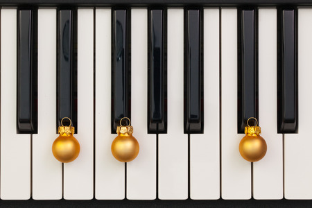 Top view close up shot of piano keyboard and Christmas decoration. Flat Lay Imageの写真素材