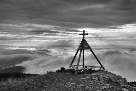Wooden monument in Gerlitzen Apls,  Austria. Inverse  weather.の写真素材