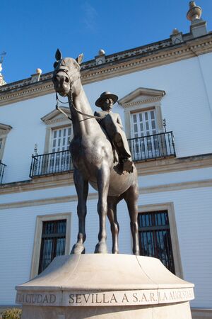 Seville, Spain - November 19,2016: Bullfight arena.View of the facade of Real Maestranza de Caballeria and the monument to the mother of King Juan Carlos, in Seville, Spainのeditorial素材
