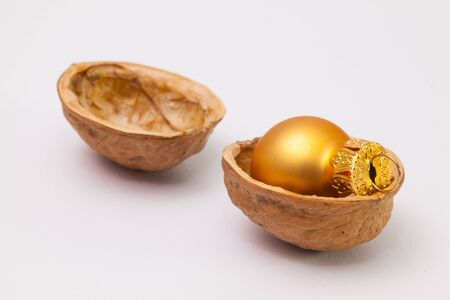 Christmas decorations in the shell of walnuts. Funny Christmas concept.