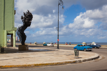 Havana,Cuba - January 22,2017: Havana Malecon. The Malecon (officially Avenida de Maceo) is a broad esplanade, roadway and seawall which stretches for 8 km (5 miles) along the coast in Havanaのeditorial素材