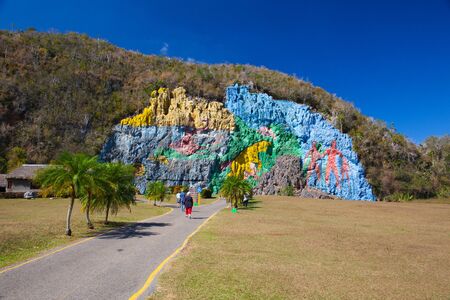 Pinar Del Rio, Cuba - January 25,2017: Mural de la Prehistoria, a giant mural painted on a cliff face in the Vinales area of Cuba. L.G. Morillo undertook the massive project of portraying world history up until the age of humans on a rock wall in the ViÃ±のeditorial素材