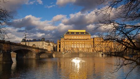 Prague,Czech Republic - March 3,2017: View on the Legion bridge and National Theatre after rain.The Prague bridges arching over the Vltava River are not only vital connecting links, but also valuable works of architecture .のeditorial素材