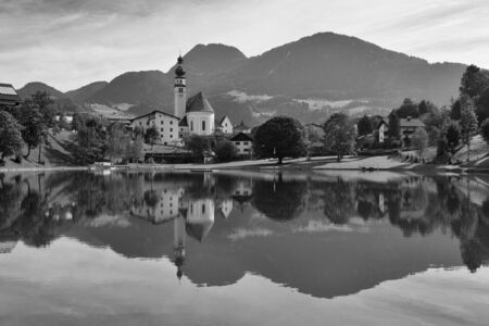 Reflection on the nature swimming pool in Reith, Alpbachtal in Tyrol, Austriaの写真素材