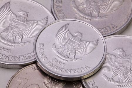 Detail of different Indonesian rupiah  coins on the table.の写真素材