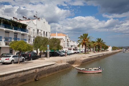 Tavira, Portugal - July 2, 2014: View of Tavira via the Gilao River on the southern Portuguese coast of the Atlantic. Tavira is an ancient Moorish town that has retained its unique character and heritage to become one of the finest resort towns of the Algのeditorial素材