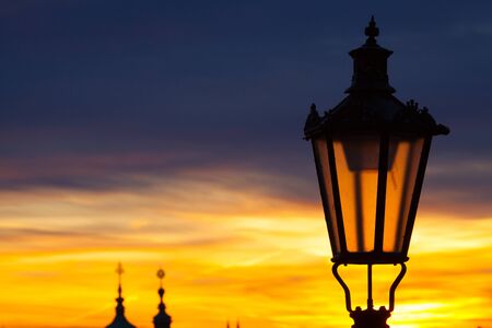 The historical lantern captured by the evening in Pragueの写真素材