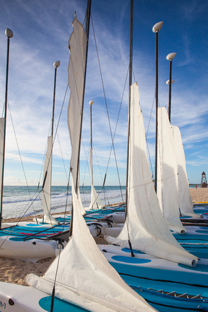 Playa Paraiso, Mexico - February 4, 2018: Colorful sail catamarans on the beach at Caribbean Sea of Mexico. This resort area is popular destination with the most beautiful beaches.のeditorial素材