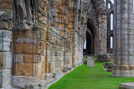 Graceful arches of the Whitby Abbey, Ruins near York, Englandの写真素材