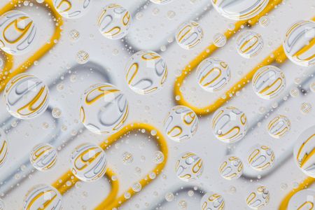 Color background with raindrops and paper clipsの写真素材