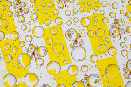 Flags  of Vatican City, behind a glass covered with rain drops.Pattern from flags Vatican Cityの写真素材