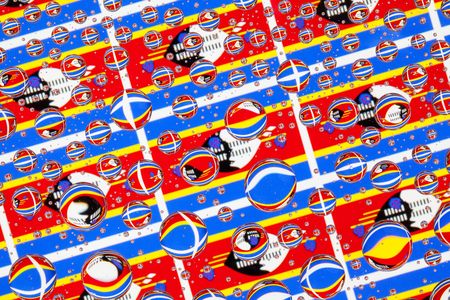 Flags  of Swaziland, behind a glass covered with rain drops.Pattern from flags of Swaziland
