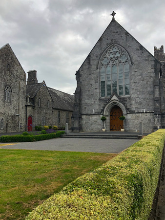 Holy Trinity Abbey Church is now the Roman Catholic parish church in the centre of the picturesque nineteenth-century estate village of Adare.のeditorial素材