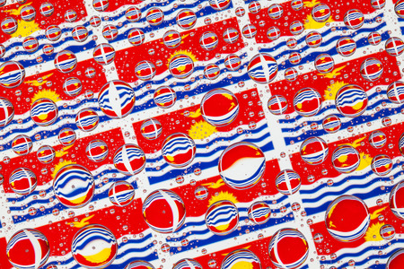 Flags  of Karibati, behind a glass covered with rain drops.Pattern from flags of Karibati.  3D illustrationの写真素材