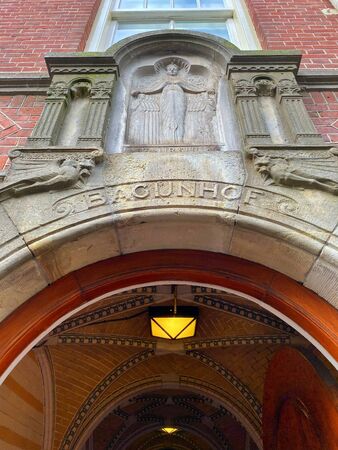 Main entrance to the Begijnhof. It  is one of the oldest hofjes in Amsterdam. A group of historic...