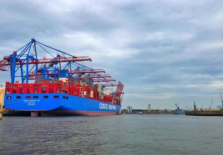 Hamburg,Germany - August 17,2018: The container ship COSCO Shipping Leo in Hamburg harbor....