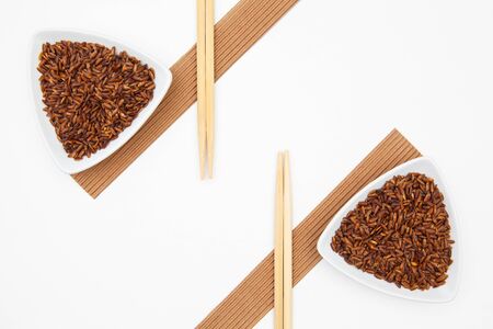 Top View Of White Sushi Plate With Rise And Chopsticks. Symmetry Food Designの写真素材