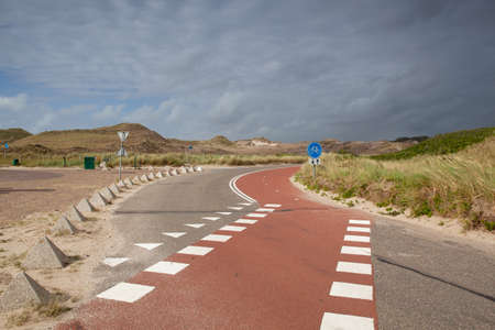 Empty parking place without foreign tourists after the coronavirus pandemic. Hargen aan Zee,...
