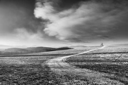 Lookout tower for hunting on the hill at sunrise. Winter scenery.の写真素材