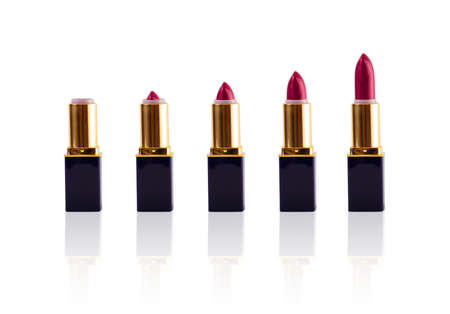 Opened red lipstick isolated on white backgroundの写真素材