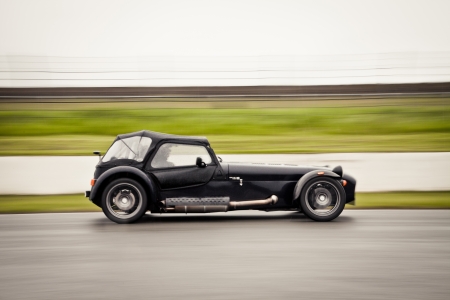 Sport car on rainy track