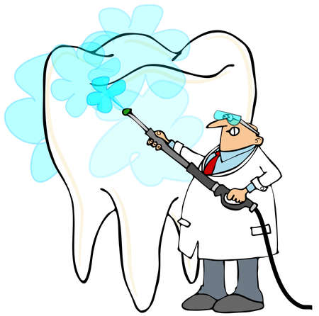 Dentist pressure washing a giant toothの写真素材
