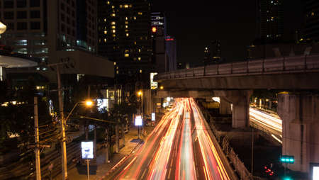 Chongnonsi sky train station, Bangkok, Thailand - May 20, 2017: Light  trails on traffic street at...