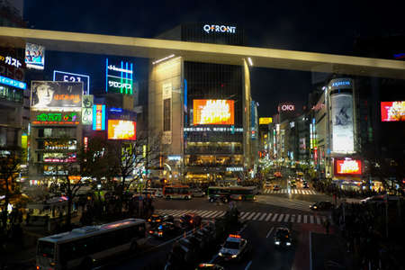 Shibuya, Tokyo, Japan - April 1, 2017: Pedestrian waiting the traffic light to walk across the famous intersection outside Shibuya Stationのeditorial素材