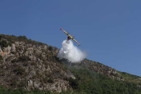 During a Canadair fire fighting operations of a forest fire