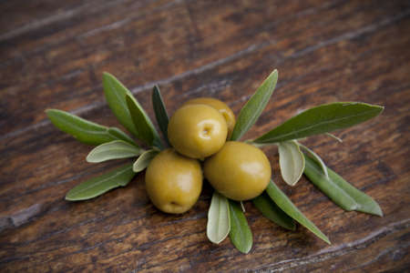 olives and olive leavesの写真素材